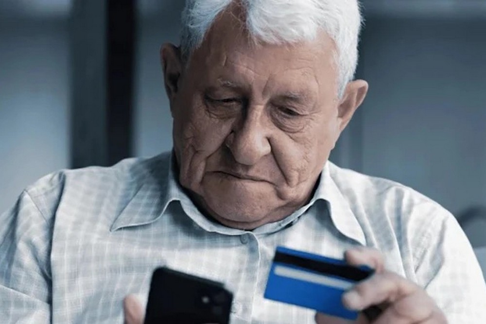 pensioner-with-card